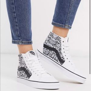 These vans are high top NWT and have animal print in the logo on the shoes.